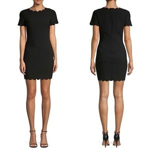 Likely black short sleeve scallop hem mini dress NWT 00